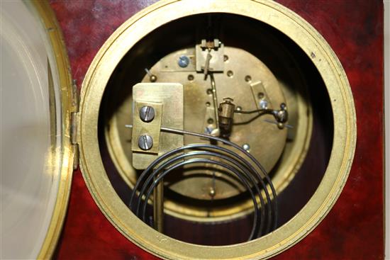 A Victorian ormolu mounted tortoiseshell mantel clock, 11.5in.